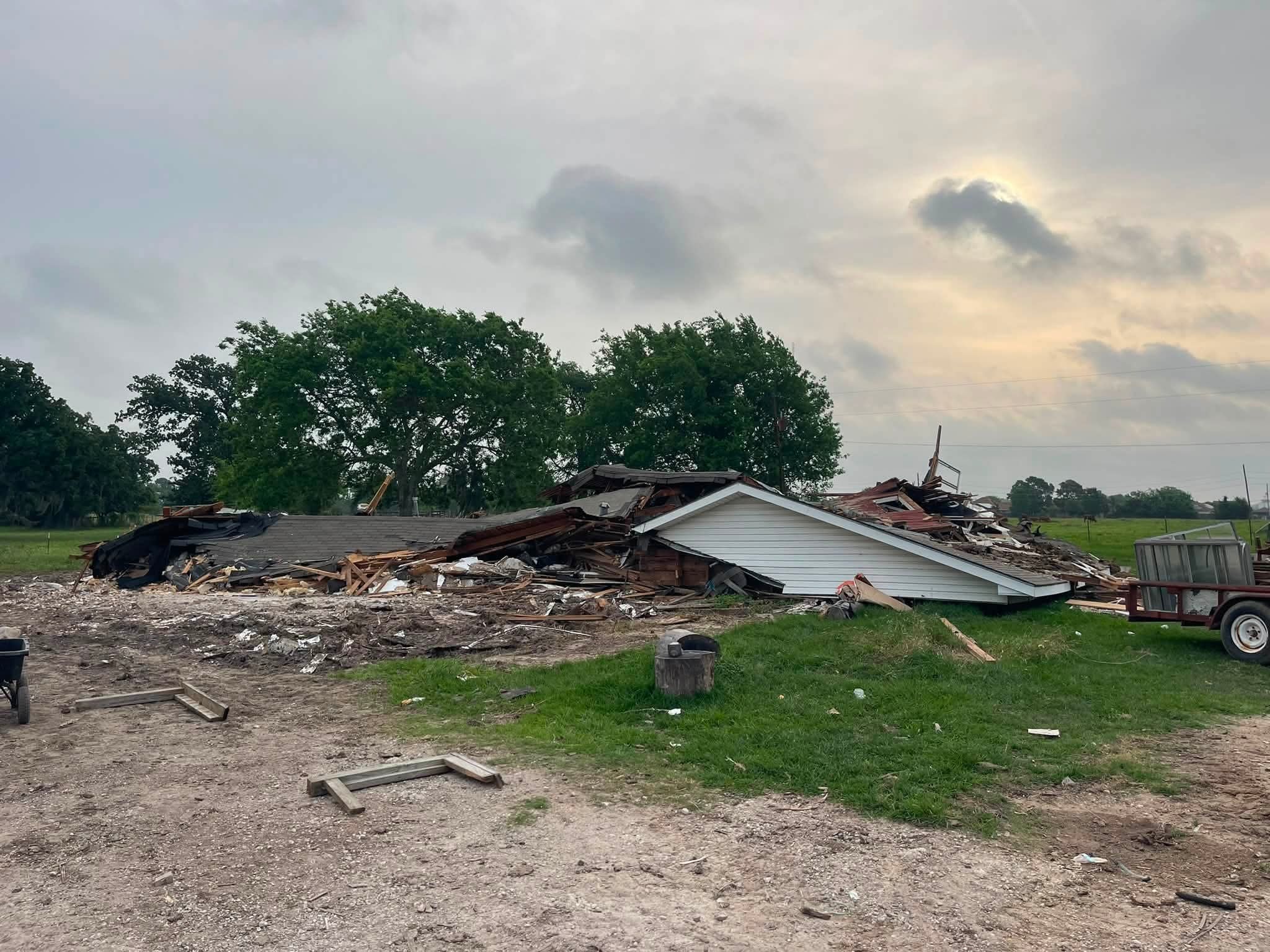 Completed house demolition — structure fully torn down